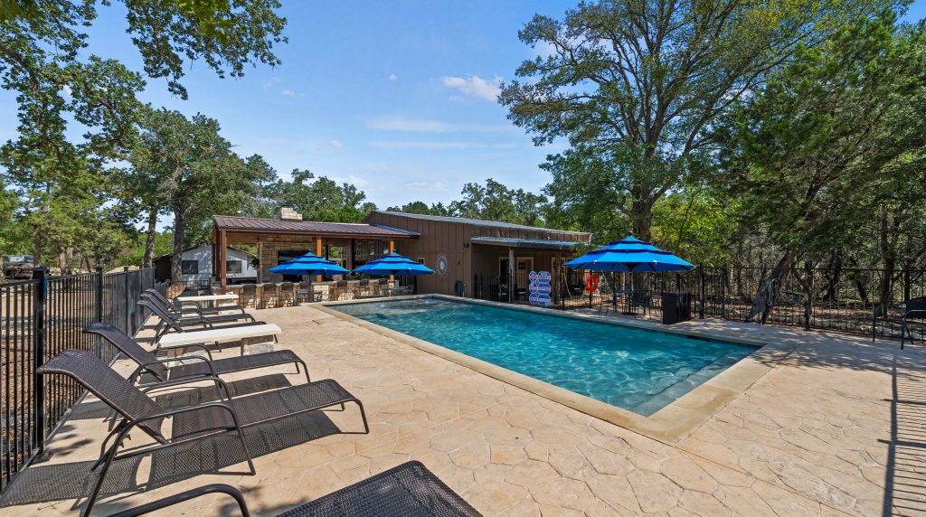 Resort swimming pool in Wimberley, one of the best places to travel in May.